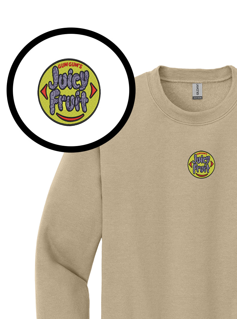 Beige sweatshirt with 'Juicy Fruit' logo on a white background